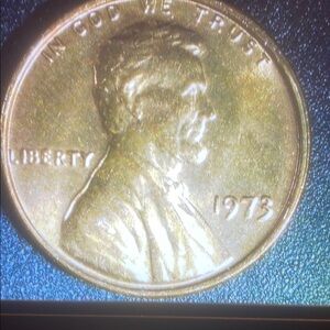 Golden 1973 Penny with Lincoln Profile